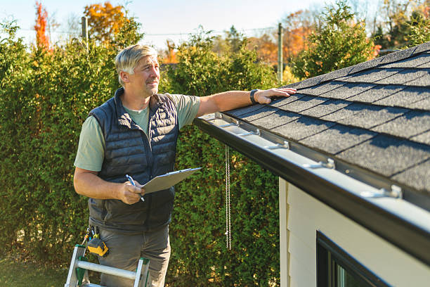Professional Roofing technician working in Cocolalla, ID